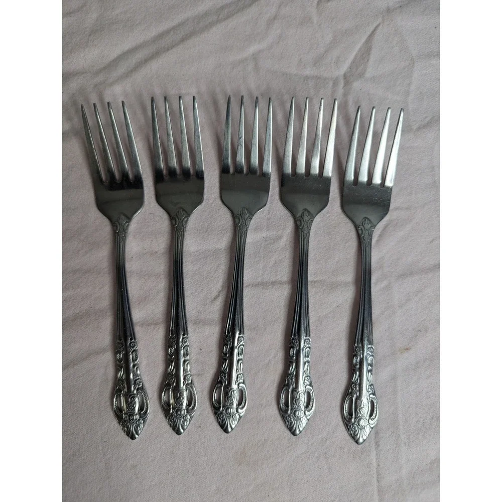 7 lot H.F. LTD Stainless stamped flower pattern 7